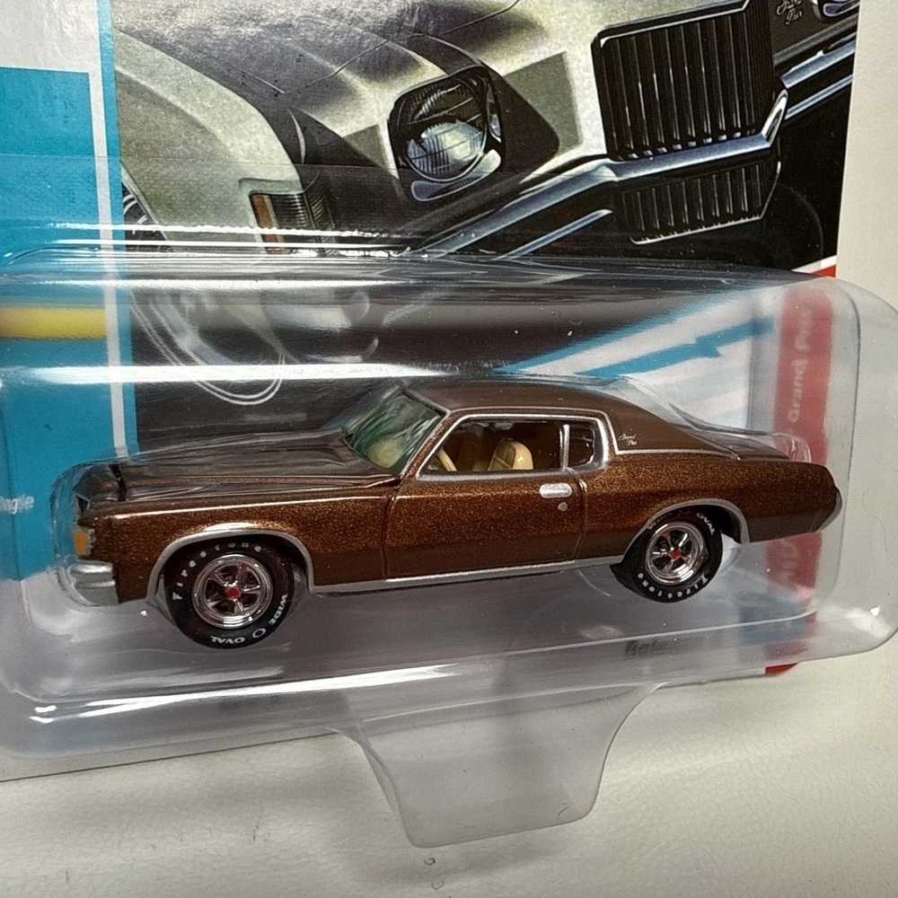 The Johnny Lightning 1971 Pontiac Grand Prix Bronze Gold 1:64 Diecast